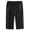 Ice Silk Croped Pants Mens Summer Thin Cool Draping Laror Size Loose Elastic Quick-Torkning Running Sports Bermuda Shorts