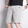 Pantaloncini da uomo estivi stile giapponese abbigliamento da lavoro pantaloni corti dritti tronchi grandi pantaloni corti da spiaggia casual moda di strada