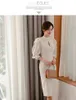 Grundläggande casual klänningar Summer Hot Sale Autumn Fashion Stand Collar Puff Sleeve Female Pencil Bodycon Dress Slim Solid Color Midi Casual Dresses 2024