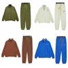 Chándales para hombres Rhude Otoño Invierno Vintage Media cremallera Cordón suelto Chaquetas bordadas Pantalones de chándal Traje Hombres Pareja Hiphop Set 230909