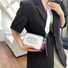 Popularne torby na sprzedaż Bag Dingdang Women's 2023 Nowe torby mody Came Camera Kolny mały kwadratowy pasek tkający jedno ramię Crossbody