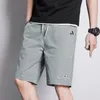 Pantaloncini da uomo estivi stile giapponese abbigliamento da lavoro pantaloni corti dritti tronchi grandi pantaloni corti da spiaggia casual moda di strada