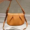 Modeontwerper tas dames enkele schouder crossbody handtas portemonnee nieuwe high-end lederen halve maan zadel tas luxe ontwerp draagbare handheld vouwbuling knoedzak