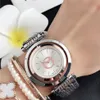 Modemärke Kvinnor Girl Crystal kan rotera Dial Steel Steel Metal Band Quartz Wrist Watch Clock P67229C