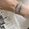 Bangle Retro Silver Feather Justerbara armband Damer Elegant Charm smycken Fashion Creative Reunion Party