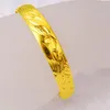 Bracciale rigido da donna spesso regolabile in oro giallo riempito con motivo drago fenice