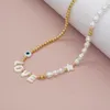 Chaînes transfrontalières baroques légères de luxe style collier chaîne coquille cinq points étoile lettre anglaise vraie et fausse perle perlée femme ne