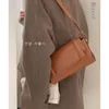 Sacos de ombro tendência de couro vintage axilas saco para mulheres design simples bolsas moda luxo crossbody casual senhoras 2023