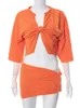 ワークドレス2023ストリートウェア2 2ピースドレスセットスカート半袖トップミニスカートマッチオレンジの不規則なスーツ