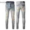 Dżinsy amiryes dżinsy designer spodnie mężczyzna dżins 869 Modna farba uliczna farba sprayowa kolorowe litery dżinsowe młodzież czarne chude dżinsy biandy0