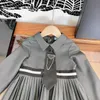 女の子のファッションのためのドレスベビー服黒のネクタイ装飾キッズフロックサイズ110-160 cm長袖ラペルチャイルドスカートSEP05