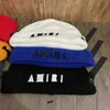 Bonnet / Skull Caps Chapeau tricoté Designer Beanie Cap Hommes Automne Hiver Caps Luxe Skull Caps Casual Ajusté 15 couleurs J0909