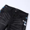 Denim Amiryes Jeans Pantalons de créateur Homme Jean 2023 Nouveaux Hommes Quatre Saisons Peinture Noire Mode UXWA