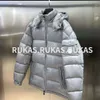 Casaco de inverno feminino engrossado design de moda de luxo usar jaqueta destacável com capuz para homens e mulheres