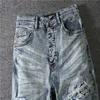 Dżinsy amiryes dżinsy designerskie spodnie mężczyzna dżins dżins z praska niebieska dziura zużyta orzech nerkowca światło szczupłe męskie i damskie moda mody ih01