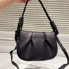 Modeontwerper tas dames enkele schouder crossbody handtas portemonnee nieuwe high-end lederen halve maan zadel tas luxe ontwerp draagbare handheld vouwbuling knoedzak