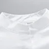 Blouses Femmes DASSWEI 2023 Été Chemise en coton blanc pour femmes Casual Sans manches Col montant Blouse Femme Élégant Top Épaulière