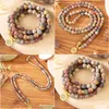 Con cuentas Mg1347 Mate natural Picasso Jasper 108 Mala Pulsera Lotus Charm Yoga 4 Wrap Meditación Joyería espiritual Drop Delive Dhgarden Dhqyd