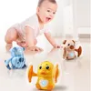 Intelligence toys Voiceactivated Induction Cartoon Scrolling Toy Baby Light Music Flipping Monkey Piggy Children Interactive Gift 230911
