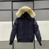 Männer Daunen kanadische Männer Pilot Daunenjacke Echt Wolf Pelz mit Kapuze Leinwand Brief Patch Reißverschlusstaschen warme dicke Oberbekleidung Designer Frauen Wintermantel L230911