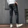 Jeans clássico masculino marca de moda casual estiramento retro jeans masculino fino ajuste xintang denim fábrica