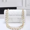 Bolsos Top Designer Custom Luxury Brand Bolso Bolso de mujer 2023 Cuero Cadena de oro Crossbody Negro y blanco Pink Clip Bolsas de hombro de piel de oveja