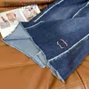 Kjolar designer kjolar hög midja kvinnor denim kjol lång 2023 ankomster blå himmel ljus grå casual jean för damer jupe longue femme m2f7 l230912