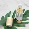 30 ml lyxig tom kosmetisk luftlös flaska guld lysande bärbar påfyllningsbar pump dispenser flaska för lotion drop vwcpb