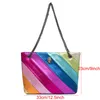 Bolsas cosméticas Estuches 2023 Reino Unido Marca Rainbow Bolso de mujer Gran capacidad Patrón de onda Eagle Head Icon Front Jointing Bird Body Bag Hombro 230912