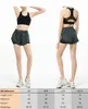 Kostuums atletische shorts voor vrouwen snel droge training sporten Active Running Track shorts met elastische en ritszakken