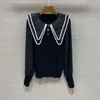 Swetery dla kobiet Wysokiej jakości 2023 Spring Autumn Tops Kobiet Down-Down Collar Freading Button Deco Długie rękawy swobodny blackk Skoczkowie