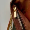 Sac à main de luxe en métal pour femmes, sac à bandoulière de luxe de styliste, sacs à main de mode parfaitement portables, sacoche en forme de cœur pour dames