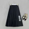 Two Piece Dress designer 2023 Summer New Miu Letter Print Pattern with Elastic Waist Design Commuter Pleated Half Skirt for Women UPOD