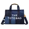 Popular bags for sale New denim color contrast splicing portable tote high-grade sense minority embroidered letter messenger