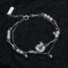 Bracelet de créateur niche de style chinois S925 bracelet à boucle de sécurité en argent sterling femme or blanc fait à la main bracelet de perles de coquille courte