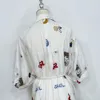 2023 Australisk klänning French Style Style Lapel Linen broderad vit oregelbunden foderklänning