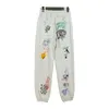 Designer High Street Cartoon Graffiti Rétro main lâche pantalons décontractés pour hommes et femmes pantalons de survêtement de style automne avec sweat à capuche chemises d'automne et d'hiverS-XL