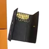 Nouveau porte-clés de luxe de luxe Mode Femmes Mini Portefeuille de haute qualité en cuir Hommes Porte-monnaie Porte-clés Porte-monnaie Accessoires de mode