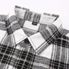 Camisas casuales para hombres Camisa a cuadros Abrigo de manga larga Decoración de bolsillo Moda Personalidad simple