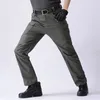 Pantalons pour hommes Pantalon militaire d'extérieur à séchage rapide Multi poches pantalon tactique élastique imperméable grande taille 6XL pantalon cargo décontracté vêtements pour hommes 230911