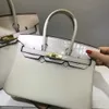 Outlet di fabbrica Borse BoKinTote all'ingrosso in vendita Borsa con motivo coccodrillo abbinata ai colori TOGO borsa monospalla in pelle di vitello con pan con logo reale ZEWZ