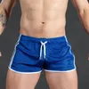 Shorts masculinos de camada única fina esportes buraco secagem rápida respirável sexy praia fitness treinamento casual