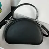 Bolso de bolos Bolso cruzado Bolso de diseñador Bolsos de hombro de color sólido de alta calidad Monedero con cremallera de cuero Hardware de metal Correa extraíble Monedero de moda Negro