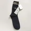 Chaussettes pour hommes Printemps Femmes Femme Version coréenne des deux barres Tube de coton rayé japonais Pile Ins Tide College Style280O