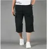 Shorts masculinos plus size 5xl verão casual baggy multi bolso militar na altura do joelho calças de carga calças soltas masculino tático