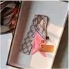 2023 Sciarpa da donna progettata da un nuovo designer, sciarpa da borsa con lettera G alla moda, cravatta, fascio di capelli, materiale 100% seta