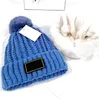 Gorros Gorros de lana al aire libre Sombreros de invierno para mujeres Hombres Moda Gruesa Gorra con puños de alta calidad Diseñador Sombrero de punto Regalo de Navidad