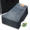 Jeans da uomo dritti 2023 sottili larghi elastici a vita media business casual maschile pantaloni di marca di abbigliamento in denim