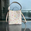 Bolso de asas con estampado floral Totes Coabag Diseñador de cuero Bolsa de cubo de alta calidad Hombro Luxurys Bolso Damas Monedero blanco 230207