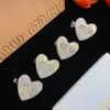 Resin peach heart earrings light luxury m IU tortoiseshell earrings women's hairpins wholesale